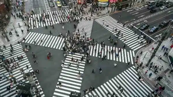 Crowd's of people cross the street in Texas 
