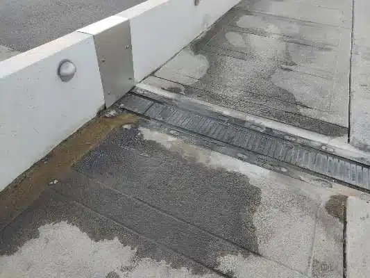 Sidewalk with drain in Texas