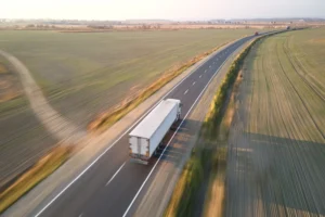 A truck driving down the highway.